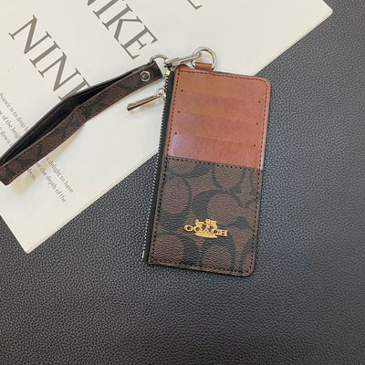 Coach Signature Zip Card Holder Wallet with Wrist Strap – Compact Luxury Card Case