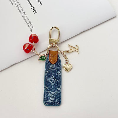 louis vuitton Cherry Charm Keychain with Monogram Leather Strap Luxury Designer Bag and Key Accessory