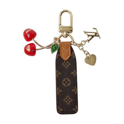 louis vuitton Cherry Charm Keychain with Monogram Leather Strap Luxury Designer Bag and Key Accessory