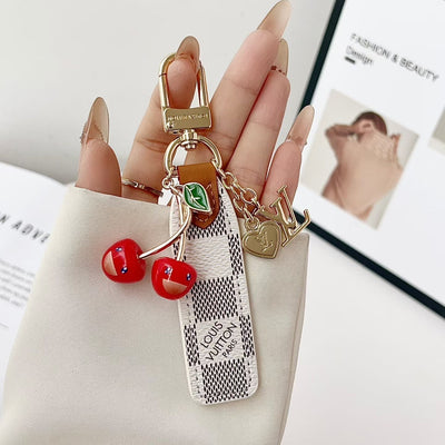 louis vuitton Cherry Charm Keychain with Monogram Leather Strap Luxury Designer Bag and Key Accessory