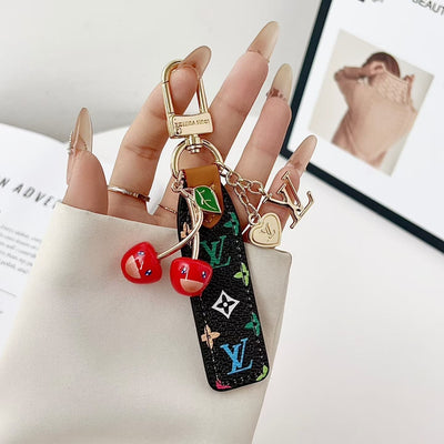 louis vuitton Cherry Charm Keychain with Monogram Leather Strap Luxury Designer Bag and Key Accessory