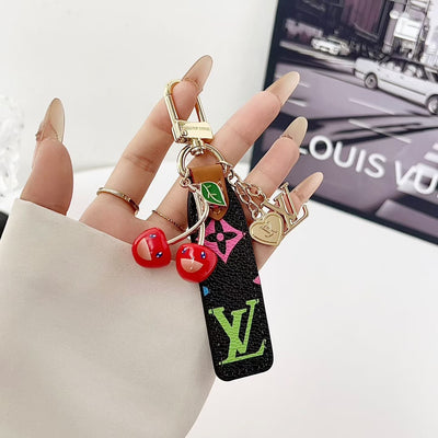 louis vuitton Cherry Charm Keychain with Monogram Leather Strap Luxury Designer Bag and Key Accessory