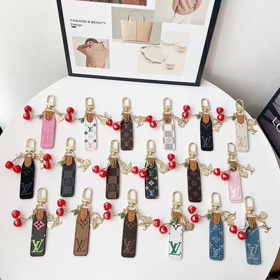 louis vuitton Cherry Charm Keychain with Monogram Leather Strap Luxury Designer Bag and Key Accessory