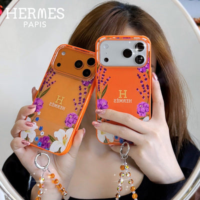 Hermès Floral Signature Case with Wrist Charm for iPhone 13 to 17 Pro Max