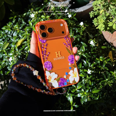 Hermès Floral Signature Case with Wrist Charm for iPhone 13 to 17 Pro Max