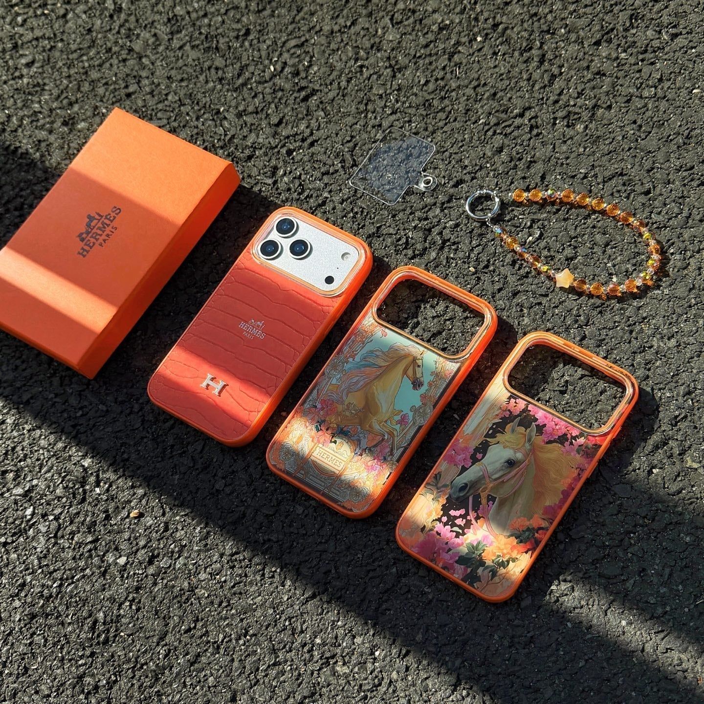 Hermès Horse Art Orange Designer iPhone Case with Wrist Chain Descript