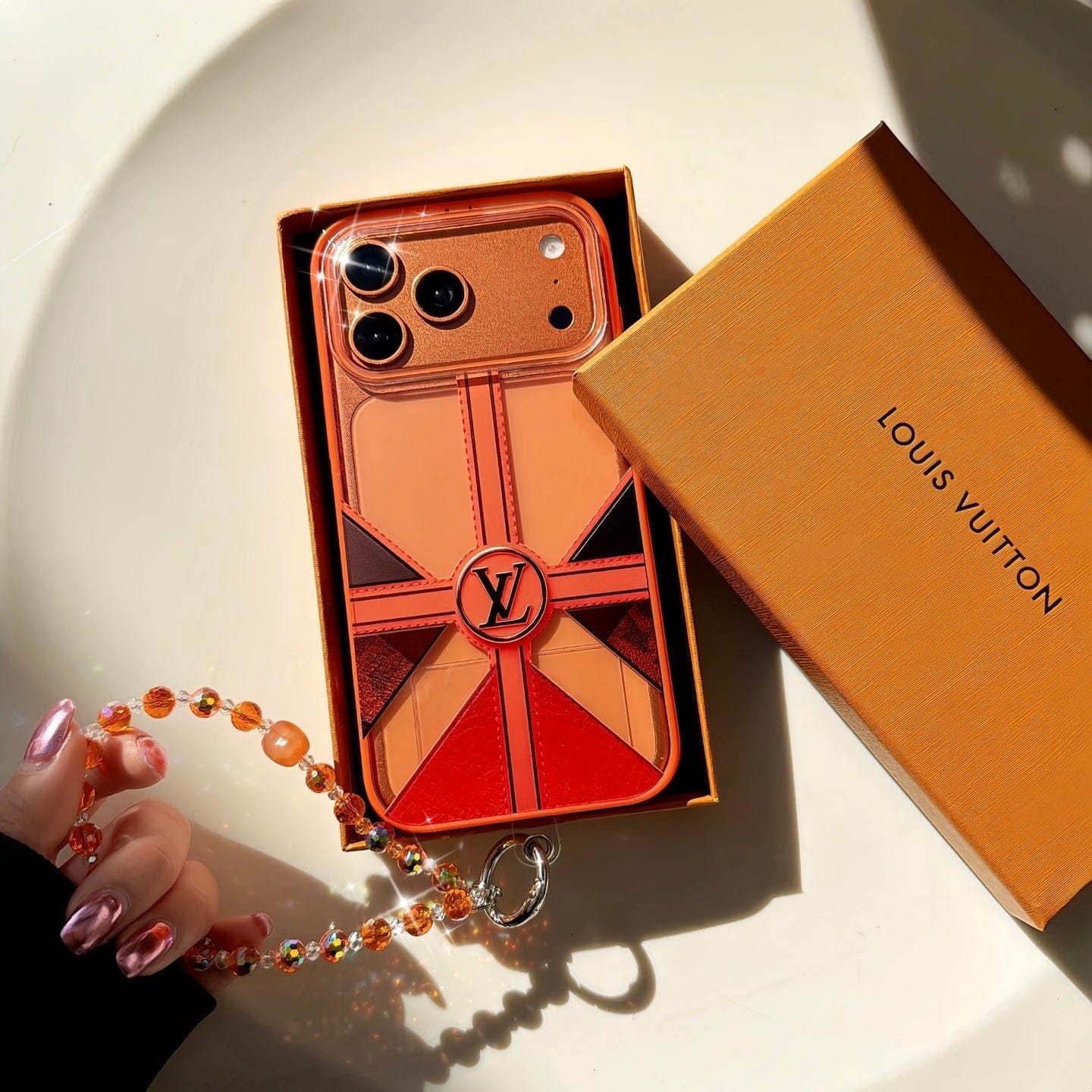 HypedEffects louis vuitton and Dior Orange Aesthetic Wrist Chain Case for iPhone 14 to 17 Pro Max