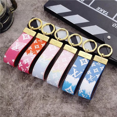 Tunde Store Louis Vuitton Pastel Monogram Key Holders with Gold Accents | LV Keychain